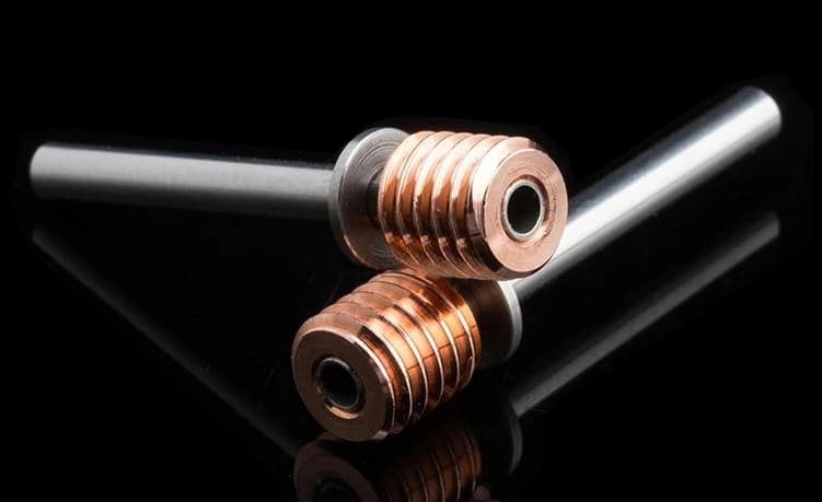 Биметаллический термобарьер со сквозной титановой трубкой